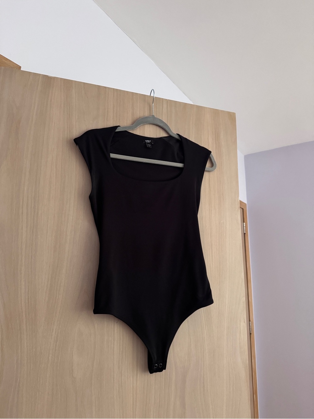 Classic Black Sleeveless Bodysuit